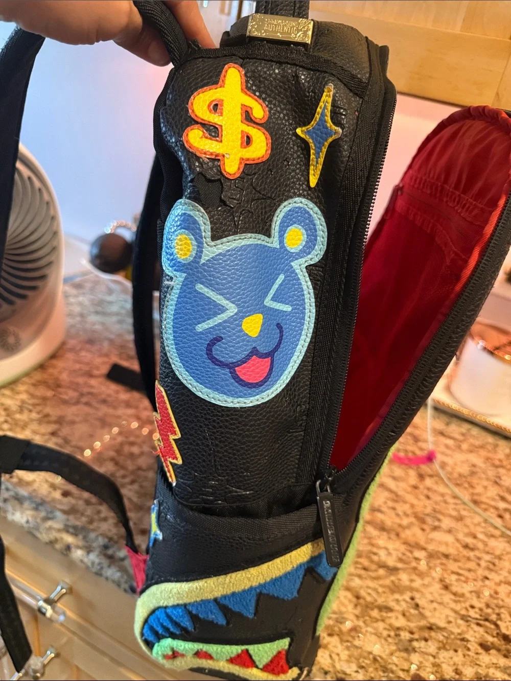 Sprayground Black Backpack with Neon Green Bear Patch and Multicolor Accents